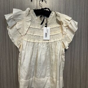 SEA cream silk blouse with ruffled cap sleeves.